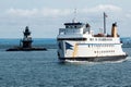 The Mary Ellen passing the Orient Point Lighthouse